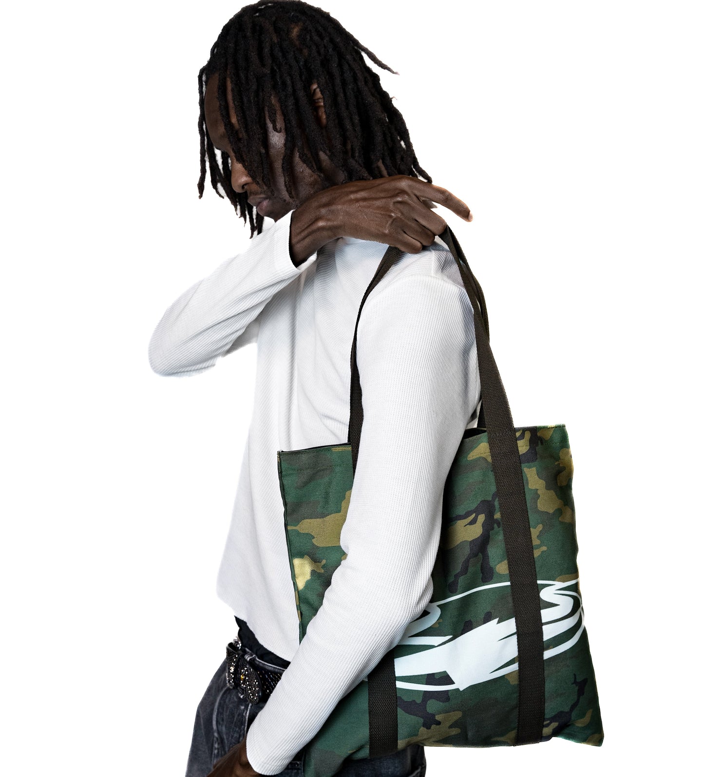 Person wearing a white hoodie and camouflage tote bag on a white background